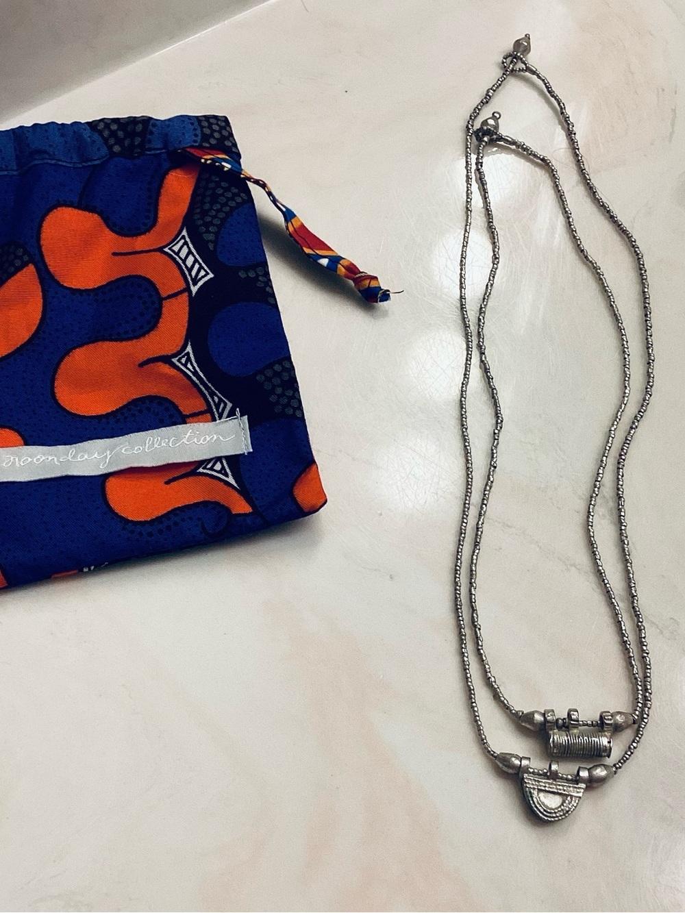 Noonday Collection silver layered necklace with textured beads